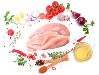 Fresh meat chicken with spices and vegetables on a white background
