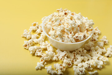 popcorn on a yellow background top view
