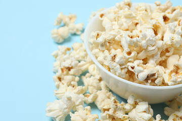 popcorn on a blue background top view
