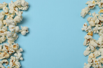 popcorn on a blue background top view
