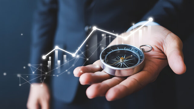 Hand holding compass with stock graph overlaying the image