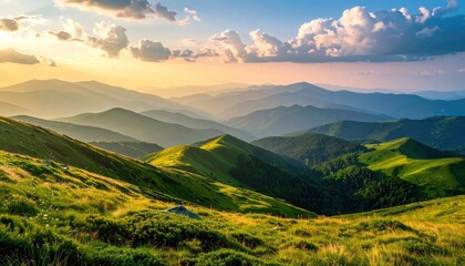Layered Mountain Range at Sunset with Golden Light and Green Hills Landscape with Dramatic Clouds in Sky Serene Natural Beauty with Varied Terrain