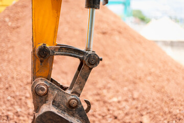 Excavator machinery operating at construction site urban environment close-up shot heavy equipment concept