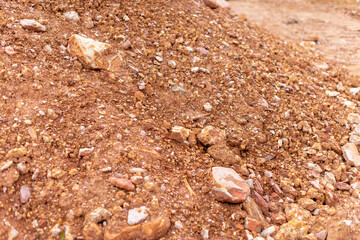 Excavation of soil and rocks construction site close-up natural environment ground level earthworks insights