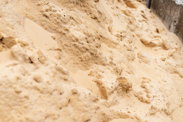 Excavation process unveils fine sand texture construction site macro urban environment close-up view