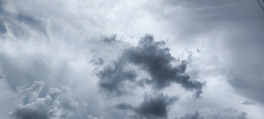 Cloudy skies make the sky look dark.