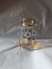 Glass Jug with White Background, A Jug on Table with White Background