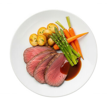 Sliced roast beef with potatoes asparagus carrots isolated on a transparent background