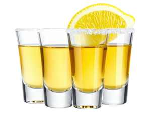 Four shot glasses, with a lemon wedge and salt rims, on a transparent backdrop