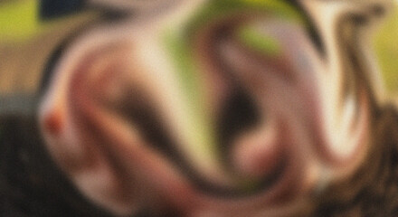 Obraz premium Abstract close up of hands gesturing in a swirling motion with blurred background