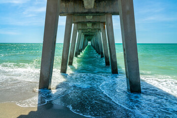 Under Venice fishing pier at Venice Beach near Sarasota, Florida © Delphotostock