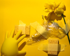 Yellow surrealism unfolds with a vibrant rubber glove, duct-taped banana, and sunlit daffodil, echoing Dadaism and World Art Day April 5, 2025, Barcelona, Spain