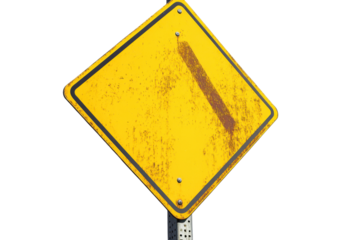 Vintage yellow shield shaped pin with metallic border isolated on transparent background. Yellow street sign isolated on white background.