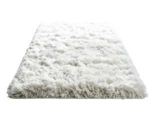 Fluffy, rectangular white rug on a stark black background, textured and soft