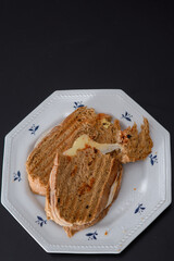 Sandwiches made of homemade bread toasted with ham, spreadable cheese and ketchup inside. Homemade food that is always good to start or end the day.