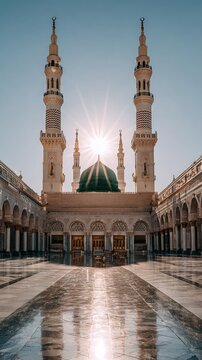Mosque courtyard, sunlit, two minarets