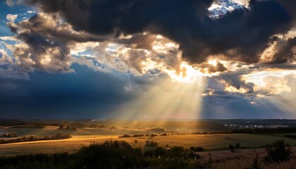 Dramatic Sun Rays Breaking Through Storm Clouds