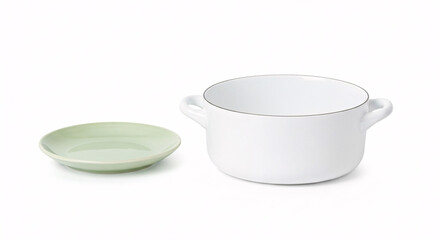 White soup bowl with handles and a green saucer on a white background.