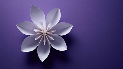 minimalistic white paper origami petals on a purple background
