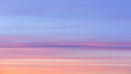 Colorful clouds in the sky at sunset as an abstract background.
