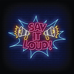 say it loud neon signboard with brick wall background vector