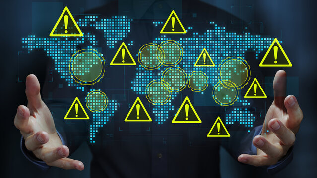 Geopolitical risks and instability in international relations. Assessing the impact of international conflict and trade war. Business person holding a world map and warning triangle icons.