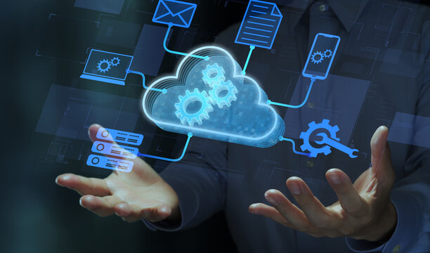Cloud virtualization and virtual machine. Business person holding cloud and gear icons.