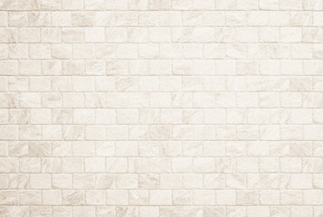 Detail of modern cream brick wall background photo. White light brick wall texture background for stone tile block painted in beige light color wallpaper.