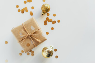 Christmas gift box and decorations on white background
