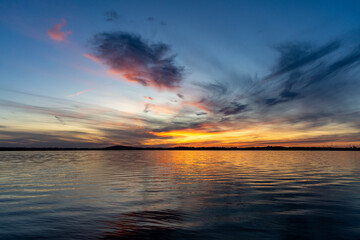 Fototapeta premium Bright, colorful summer sunset over Lake Mitkow in Poland. Evening landscape.