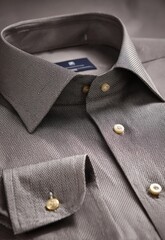 Close-up of a taupe dress shirt