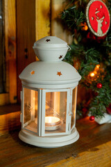 Christmas lantern on the evening window.