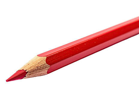 Close-up of a sharpened red colored pencil, against a stark black backdrop