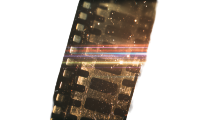 Abstract image of light passing through film strip on a black background