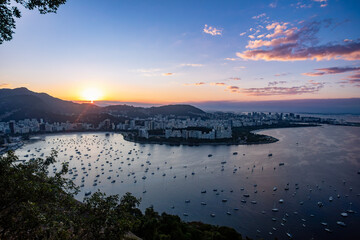 Panoramic sunset view of Rio de Janeiro central coastline, Guanabara Bay, and Santos Dumont Airport...