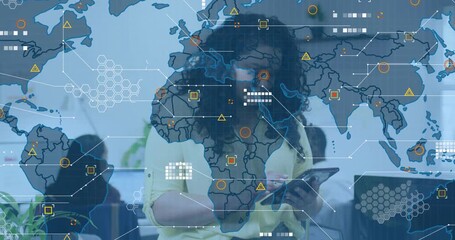 mid adult woman tapping and pinching tablet while projecting global map charts data clusters - Powered by Adobe