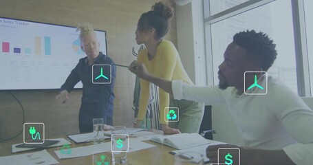 Presenter gesturing toward chart launching floating green finance icons while team discussing data - Powered by Adobe