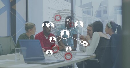 Business team discussing notes, red circles marking data, globe emerging, icons expanding network - Powered by Adobe