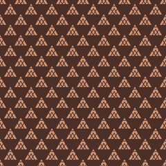 Seamless geometric pattern in acajou and antique brass colors
