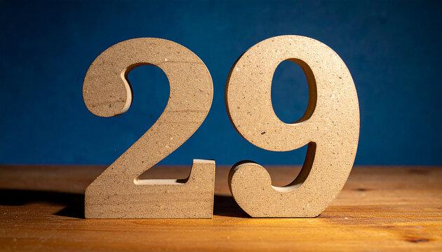 Number 29 made of wood, detailed grain texture, placed on warm wooden table, dramatic shadows