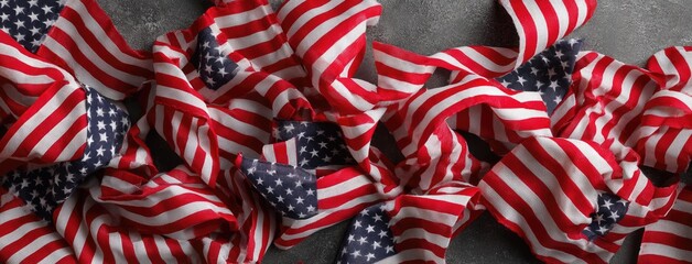 Colorful twisted fabric featuring American flags, creating a dynamic display for Fourth of July celebrations at a local event or gathering