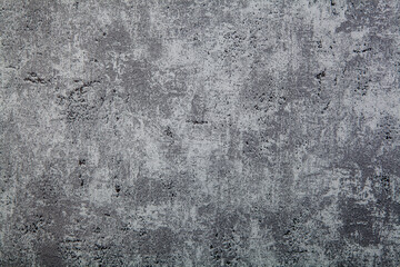 Texture of old rustic wall covered with gray stucco. Abstract background for design.