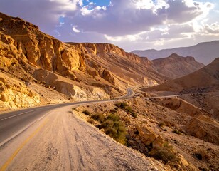 Fototapeta premium Scenic winding road through a desert landscape