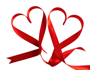 Two red ribbons shaped into hearts, intertwined on a solid black background