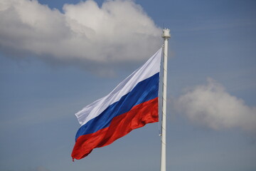 Russian flag on a flagpole in St. Petersburg