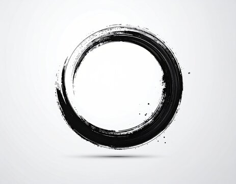 A textured black circular brushstroke on a light background with a subtle shadow