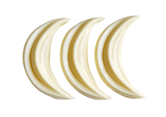 Three crescent-shaped, creamy-white objects, arranged vertically