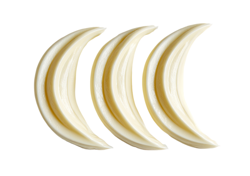 Three crescent-shaped, creamy-white objects, arranged vertically