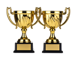 Two ornate, golden trophies with black bases and blank nameplates, isolated