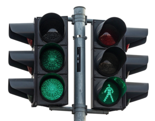 Traffic signal showing walk signal for pedestrians and green for vehicles